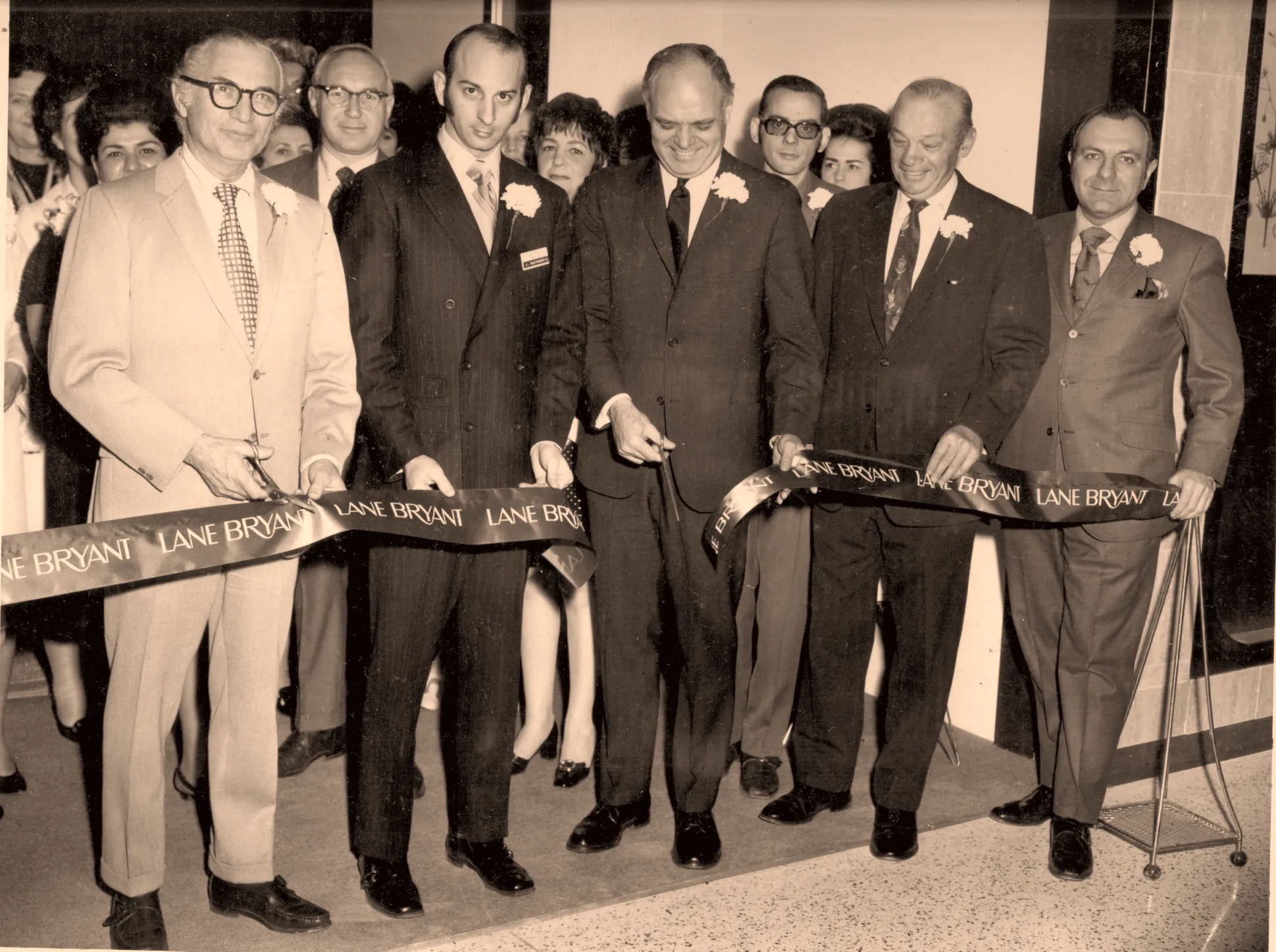 Crowds at the opening of a Lane Bryant store, mid-century.